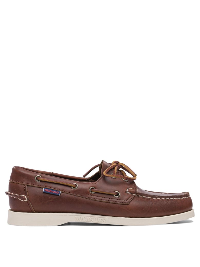 brown rubber loafers by Selfnex