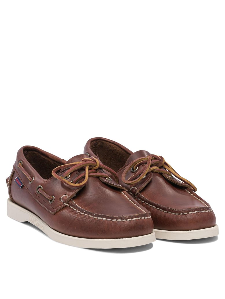brown rubber loafers by Selfnex