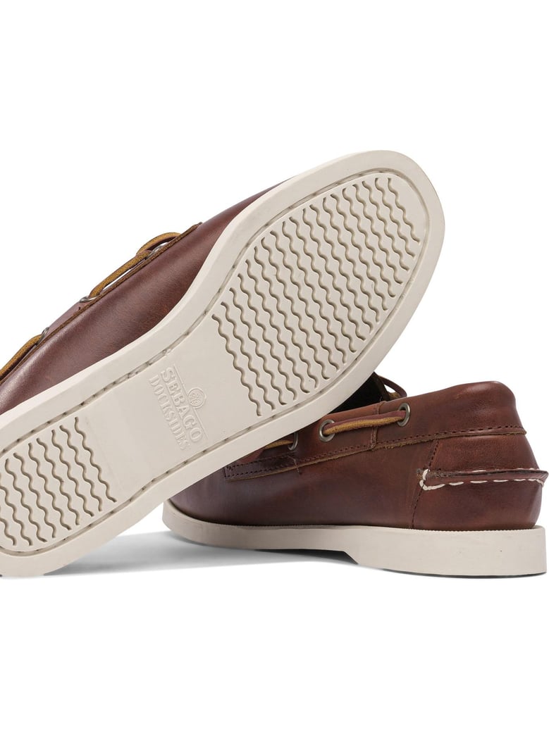 brown rubber loafers by Selfnex
