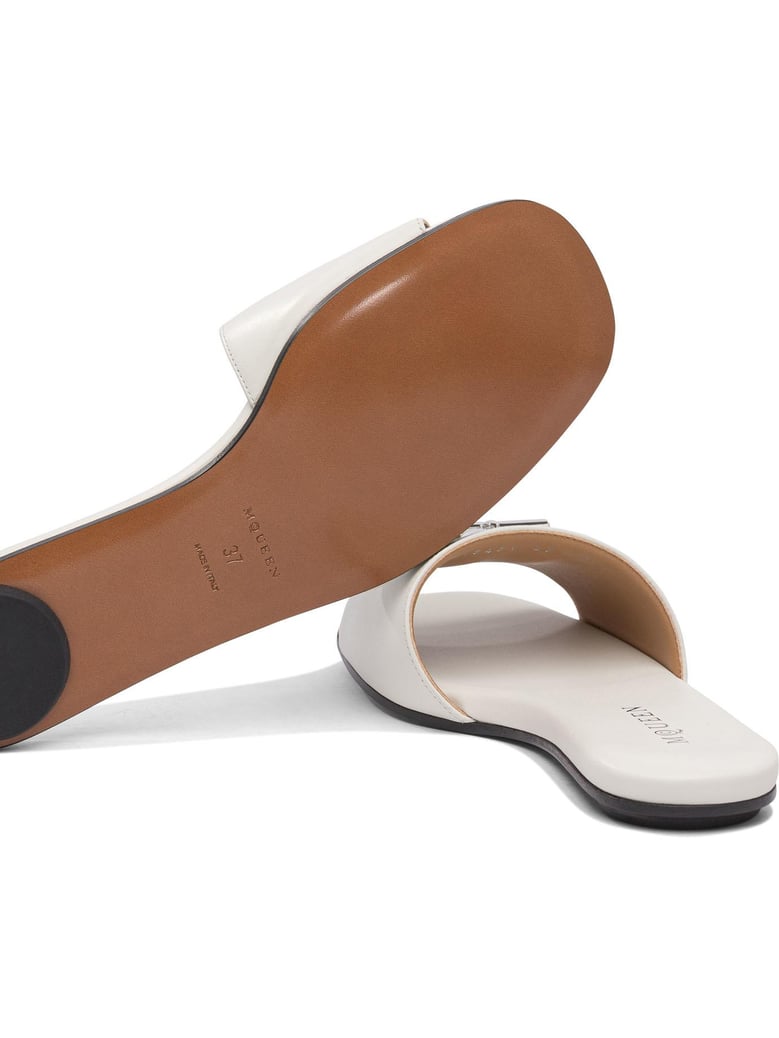 white rubber sandals by Selfnex