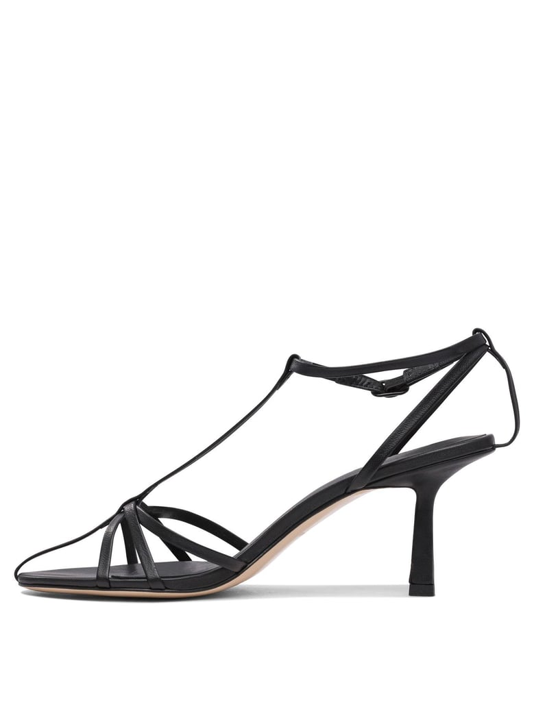 black leather sandals by Selfnex