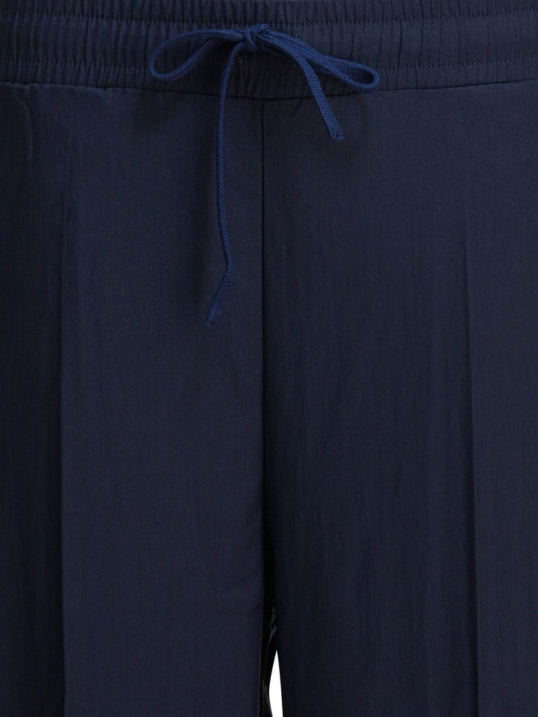 blue elastane trousers by Selfnex