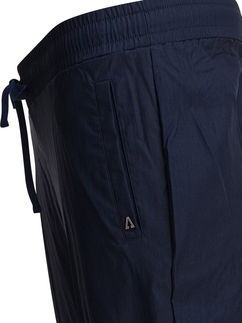 blue elastane trousers by Selfnex