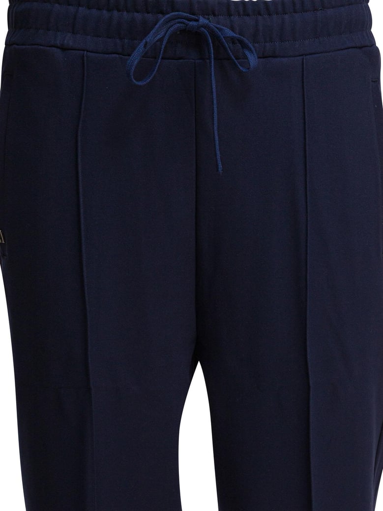 blue elastane trousers by Selfnex
