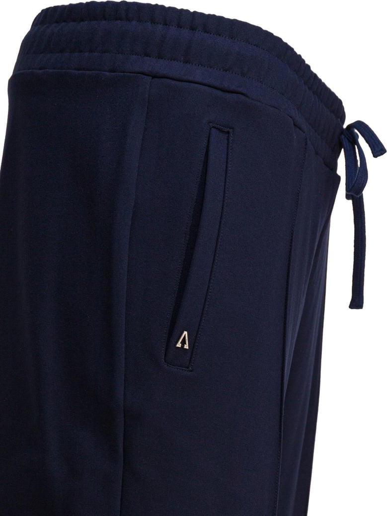 blue elastane trousers by Selfnex