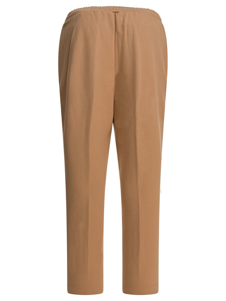brown elastane trousers by Selfnex