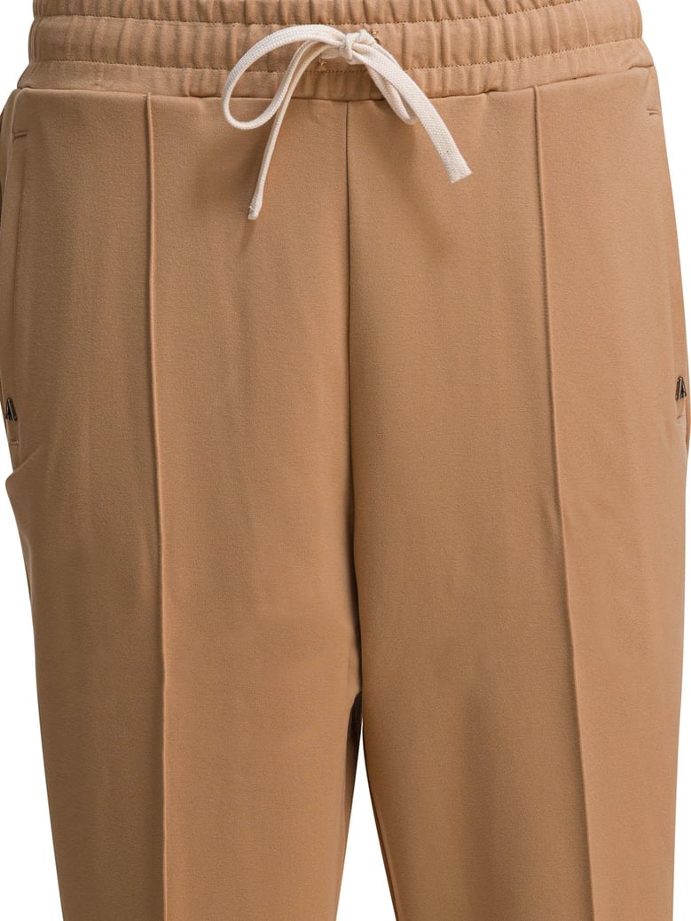 brown elastane trousers by Selfnex