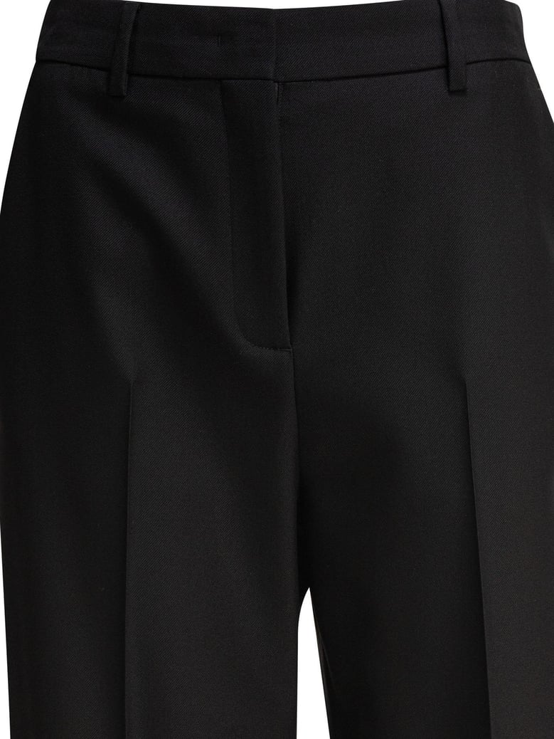 black wool trousers by Selfnex