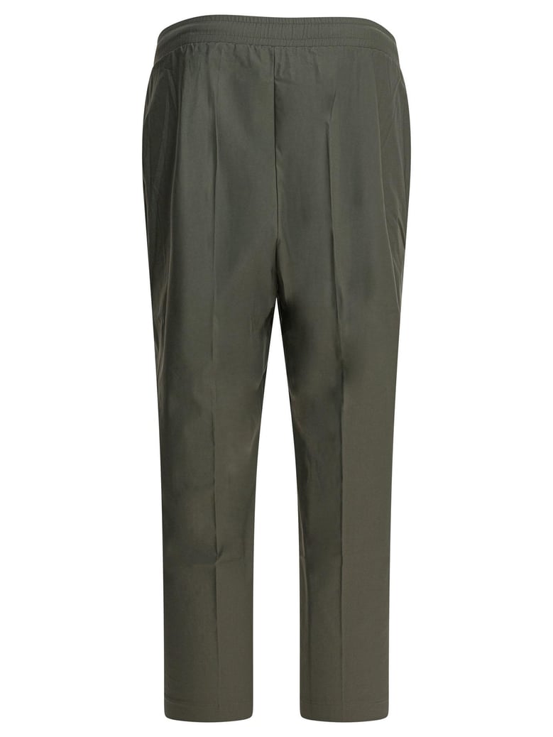 green elastane trousers by Selfnex