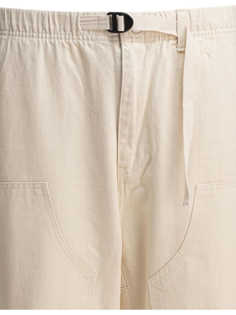 beige cotton trousers by Selfnex