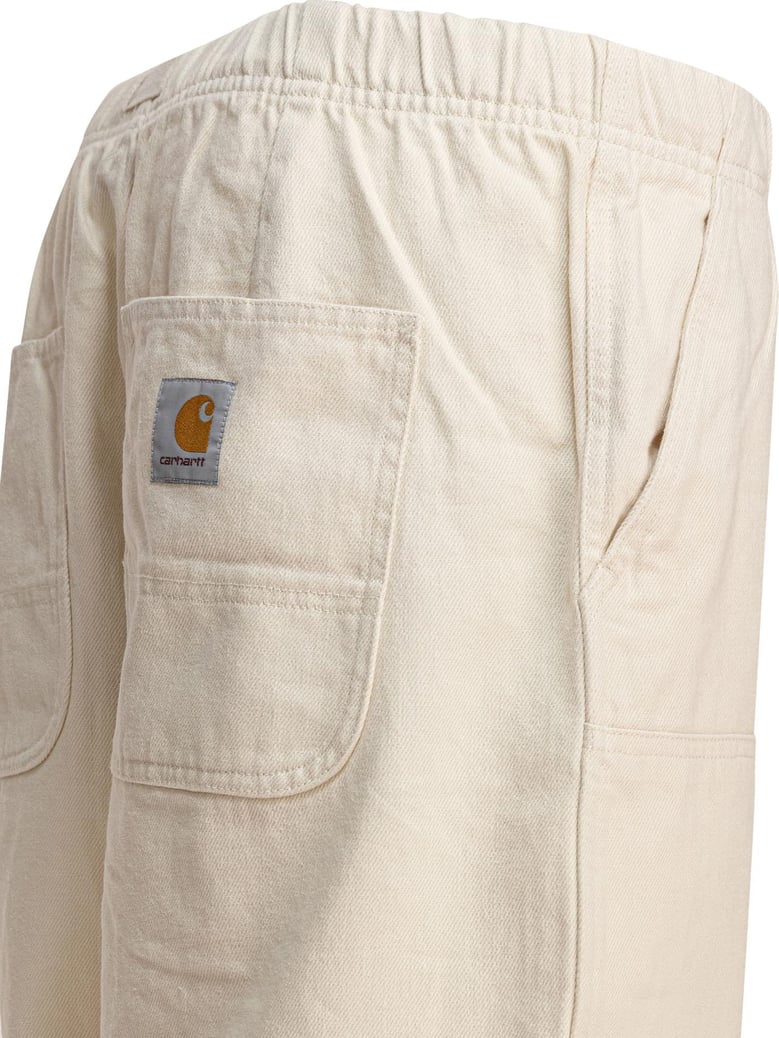 beige cotton trousers by Selfnex
