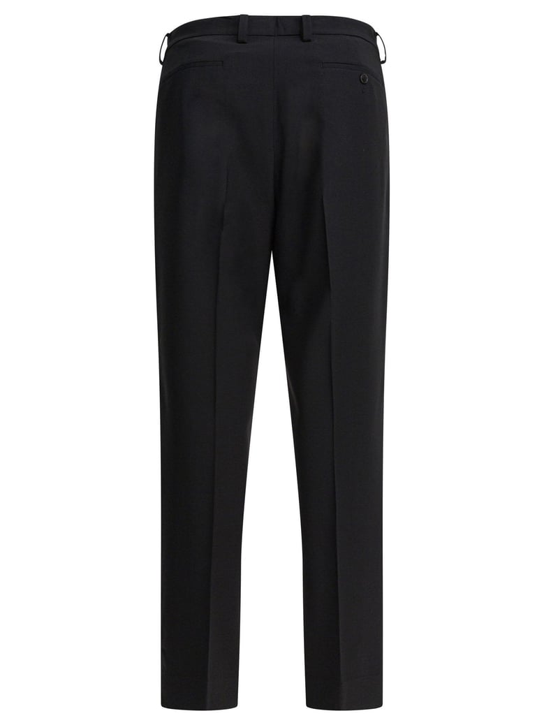 black elastane trousers by Selfnex