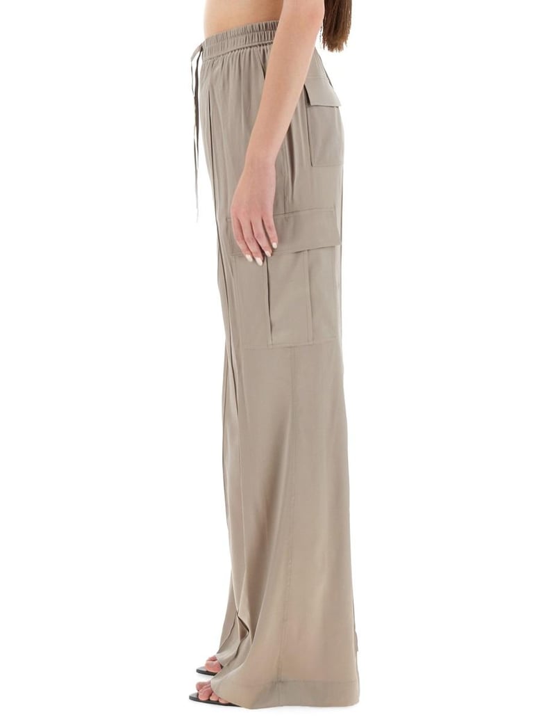 beige silk blend trousers by Selfnex