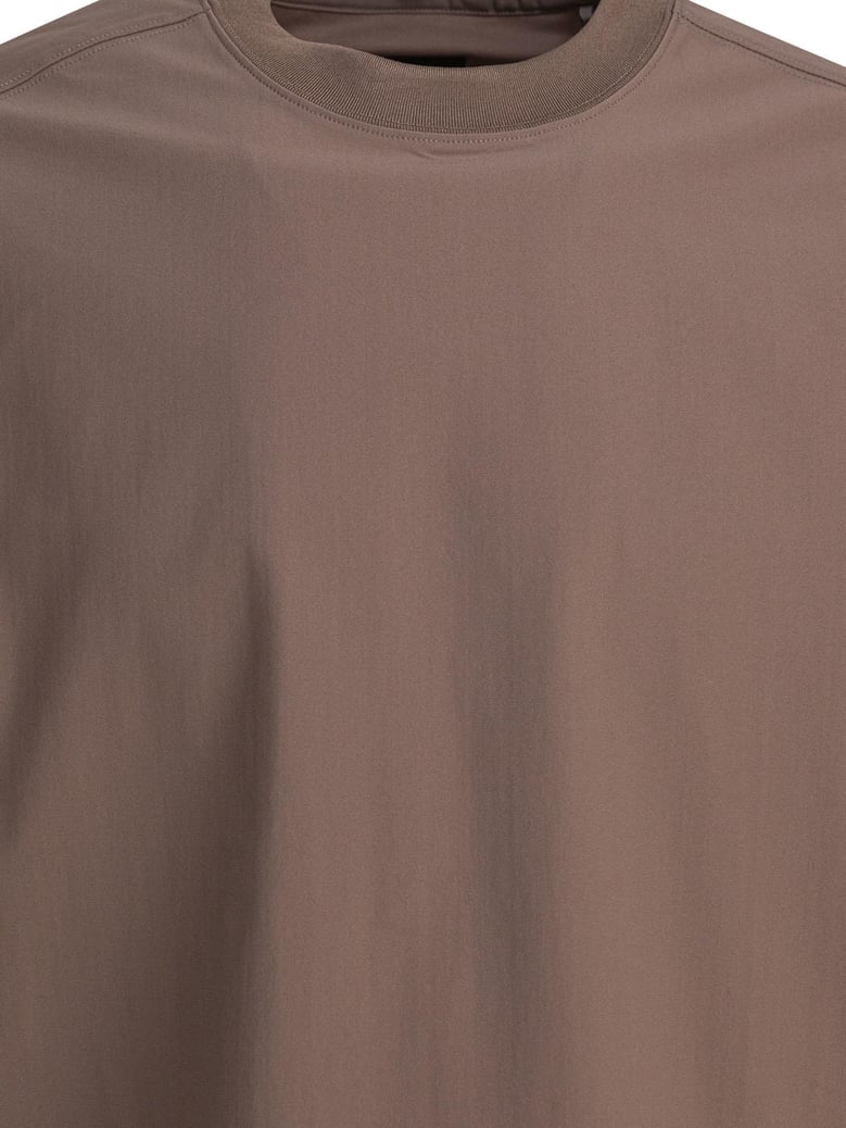 beige polyester t-shirt by Selfnex