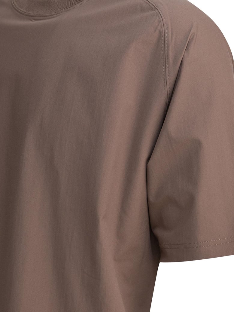 beige polyester t-shirt by Selfnex