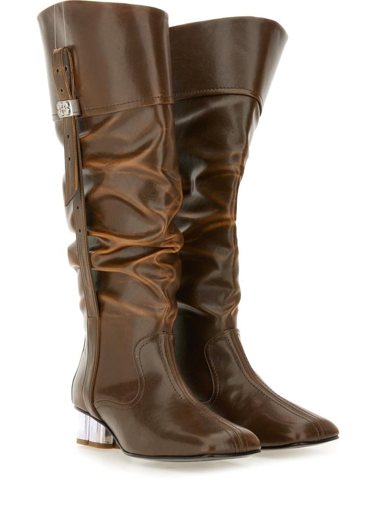 black polyurethane boots by Selfnex