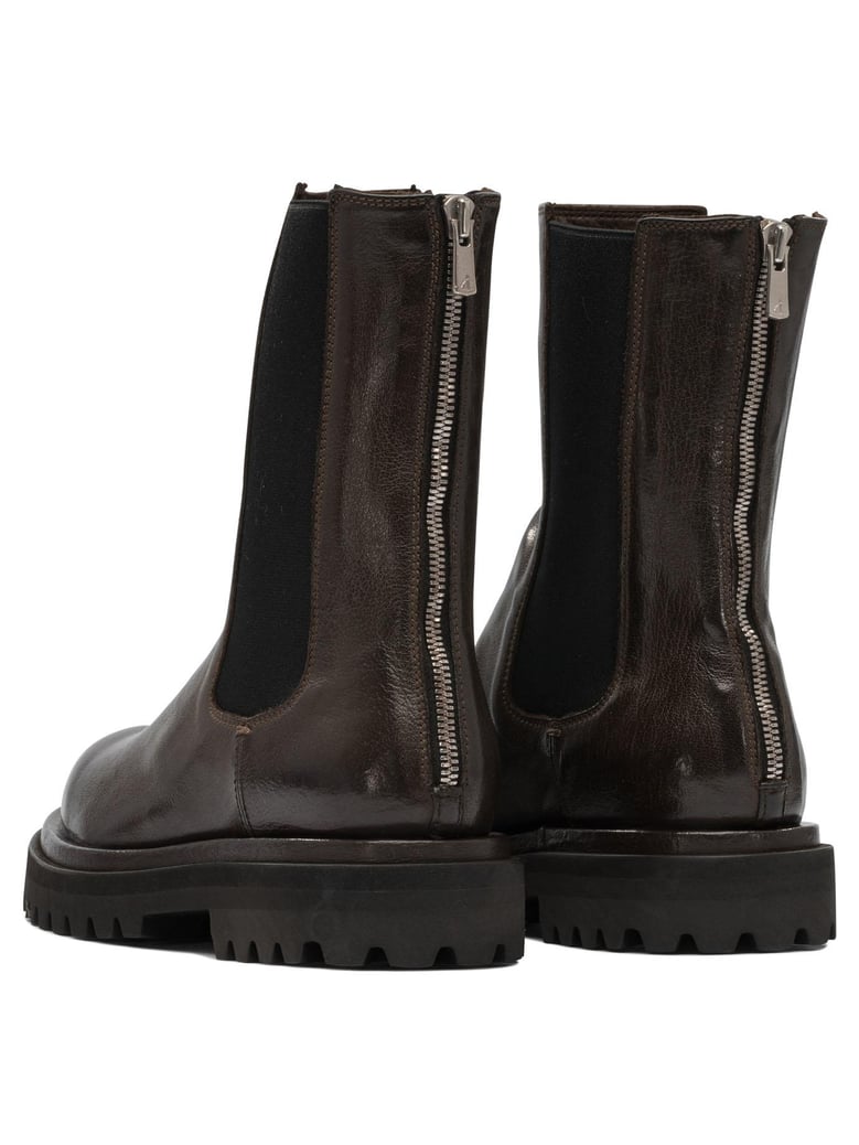 brown rubber ankle boots by Selfnex