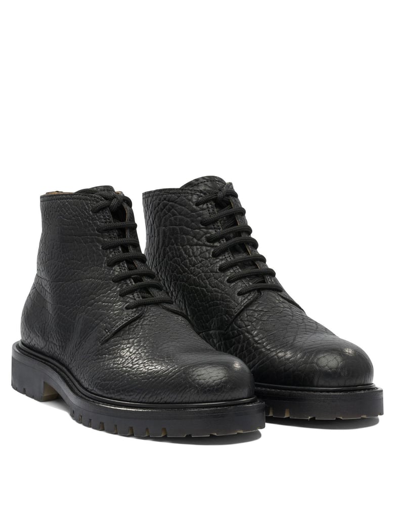 black rubber ankle boots by Selfnex
