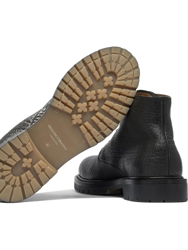 black rubber ankle boots by Selfnex
