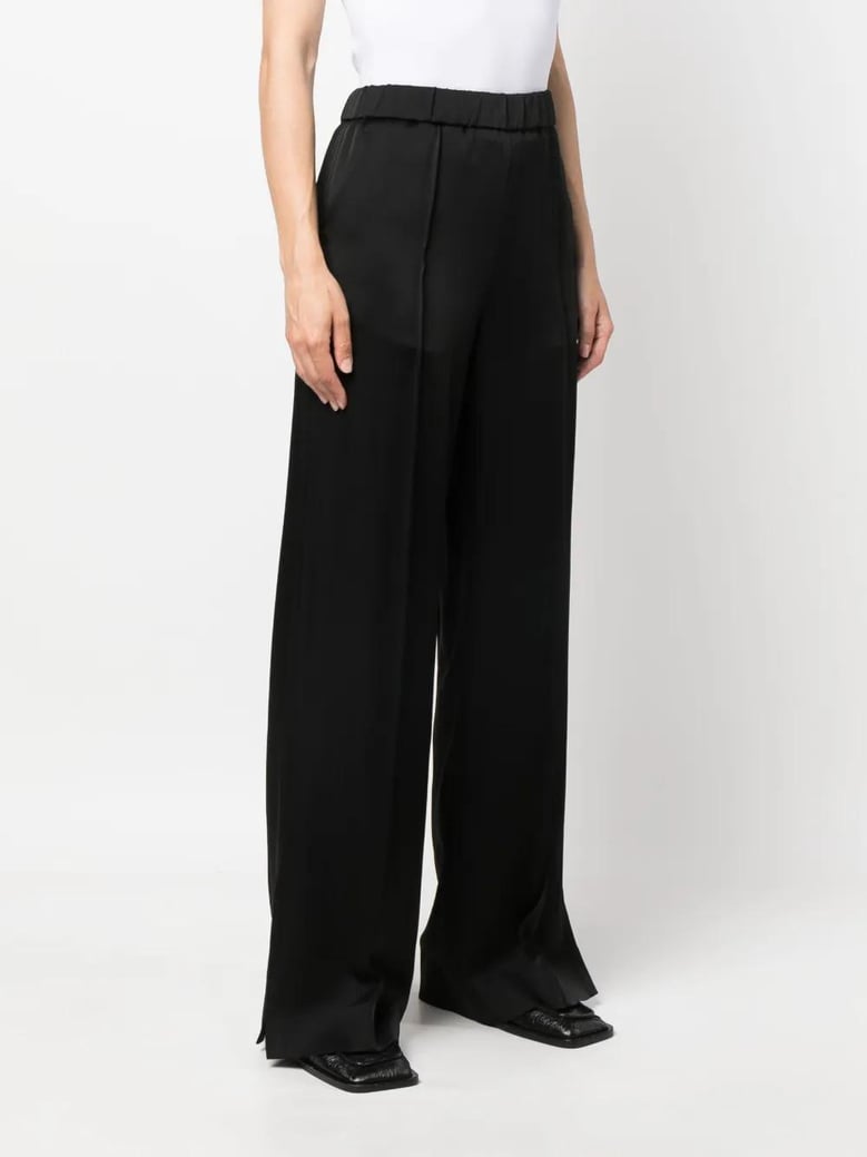 black satin palazzo pants by Selfnex