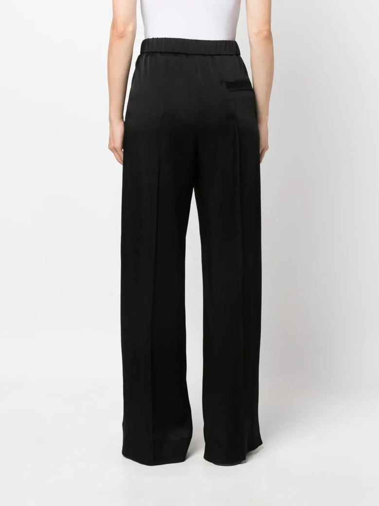 black satin palazzo pants by Selfnex