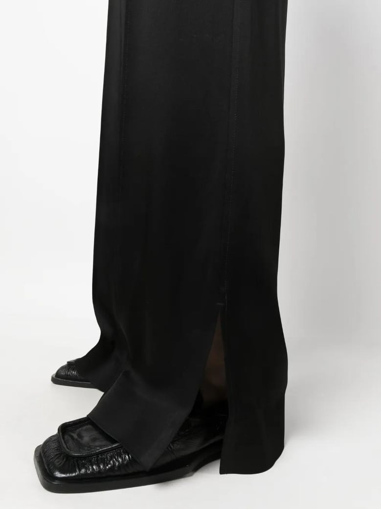 black satin palazzo pants by Selfnex