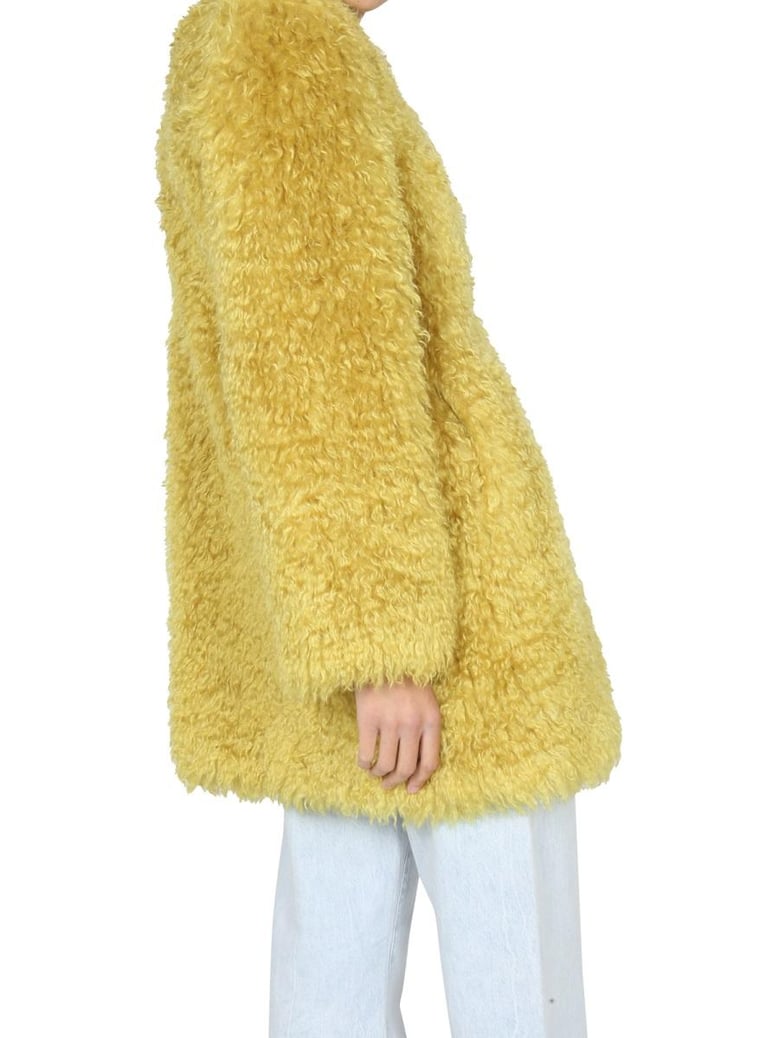 faux fur coat by Selfnex