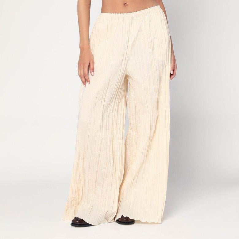 pinola-atelier pleated fabric ivory trousers by Selfnex
