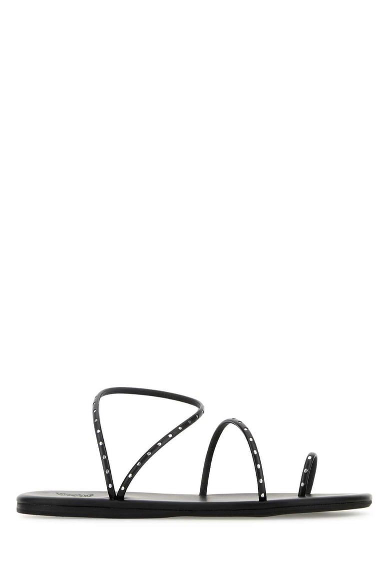 black synthetic leather astro thong sandals by Selfnex