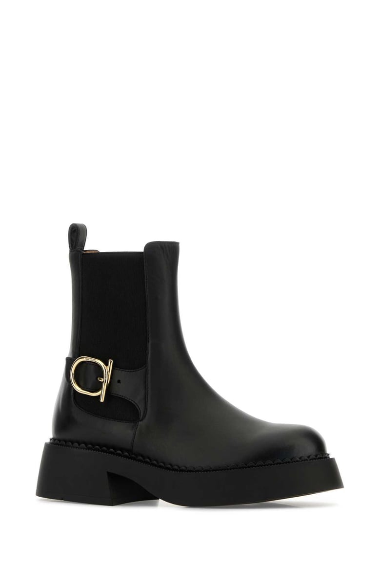 black leather tia ankle boots by Selfnex