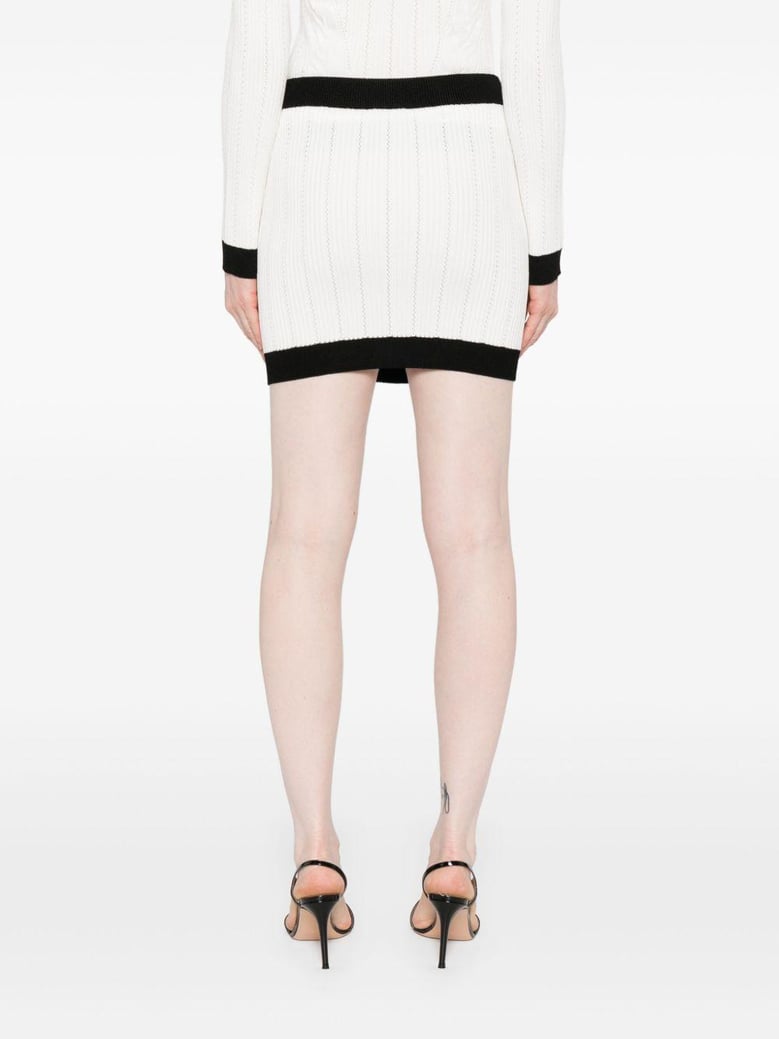 knitted buttoned mini skirt by Selfnex