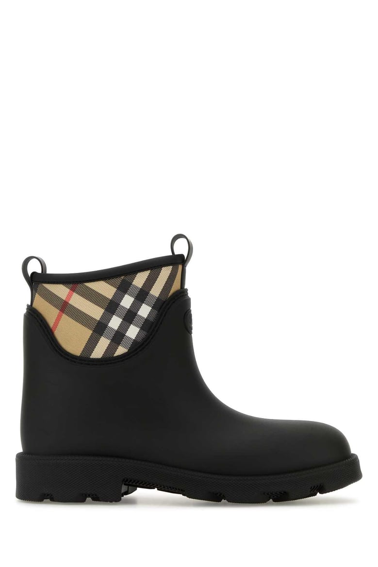 black rubber marsh stamp ankle boots by Selfnex