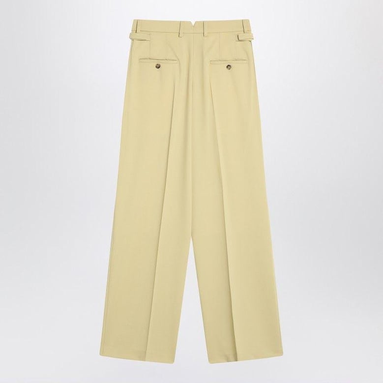 wide lime-coloured wool trousers by Selfnex