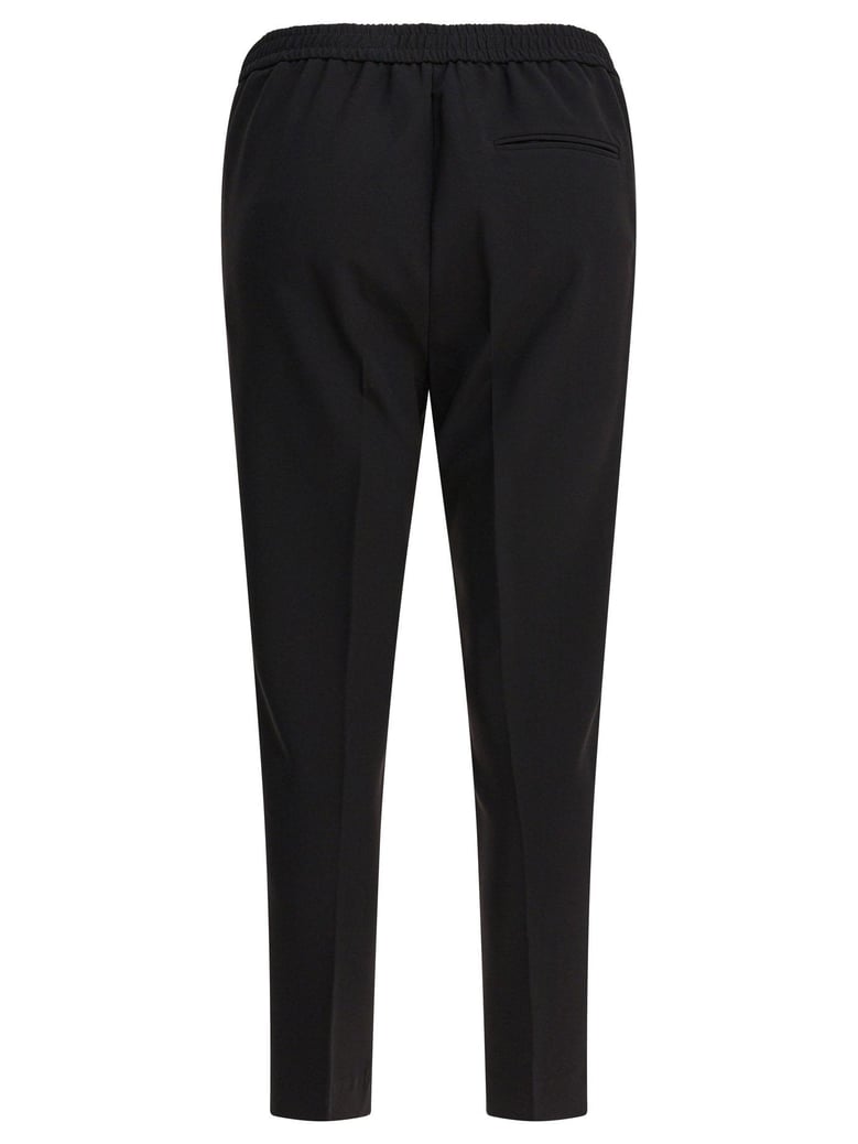 black polyester trousers by Selfnex