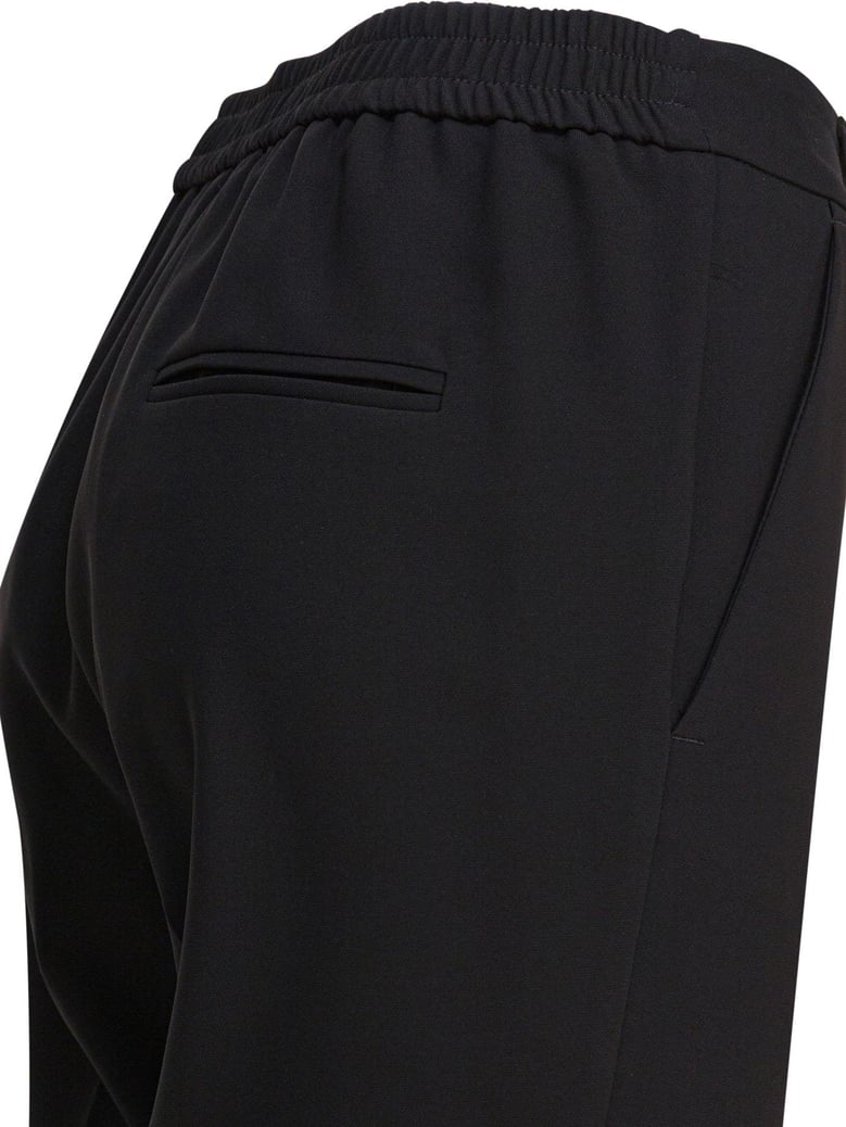 black polyester trousers by Selfnex