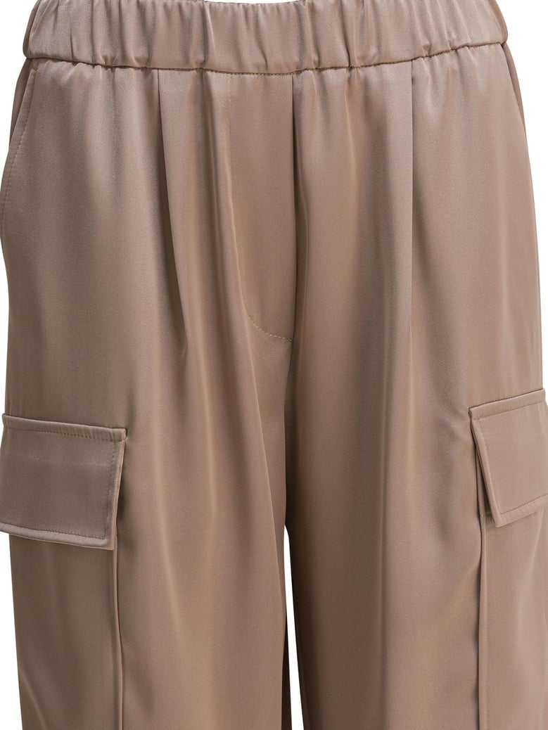 beige polyester trousers by Selfnex