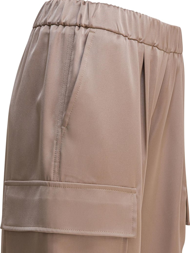 beige polyester trousers by Selfnex