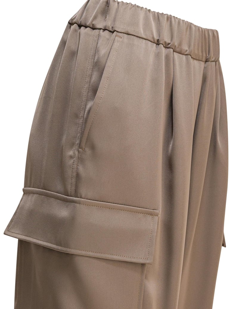 beige polyester trousers by Selfnex