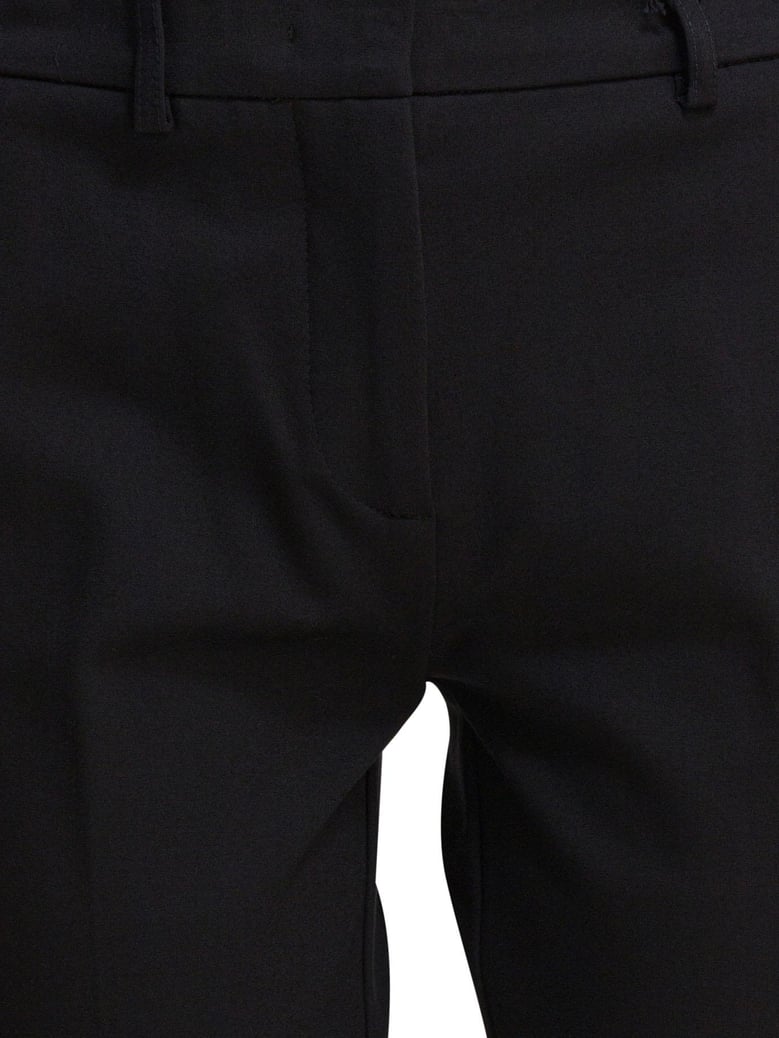 black elastane trousers by Selfnex