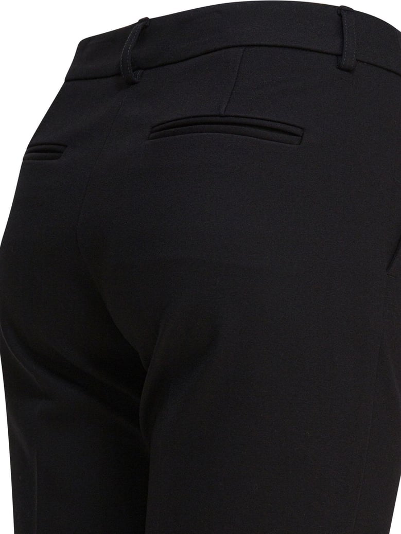 black elastane trousers by Selfnex