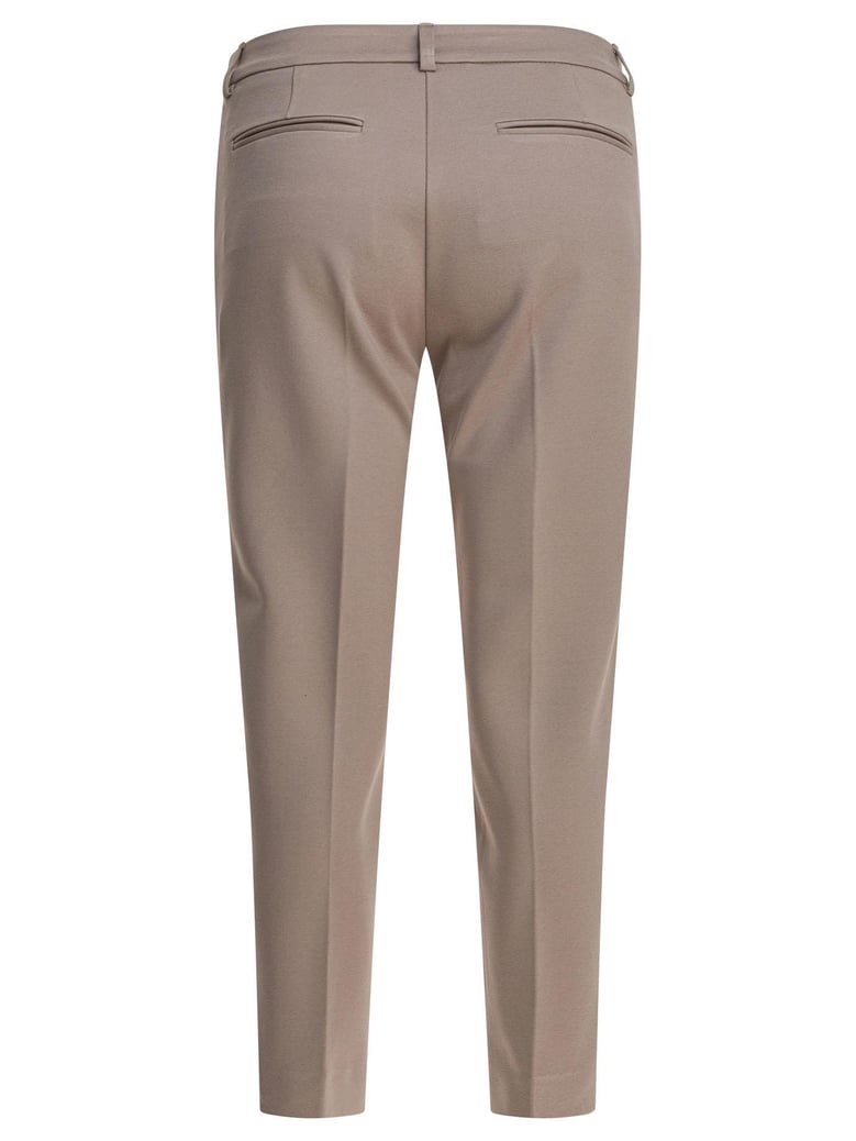 beige elastane trousers by Selfnex