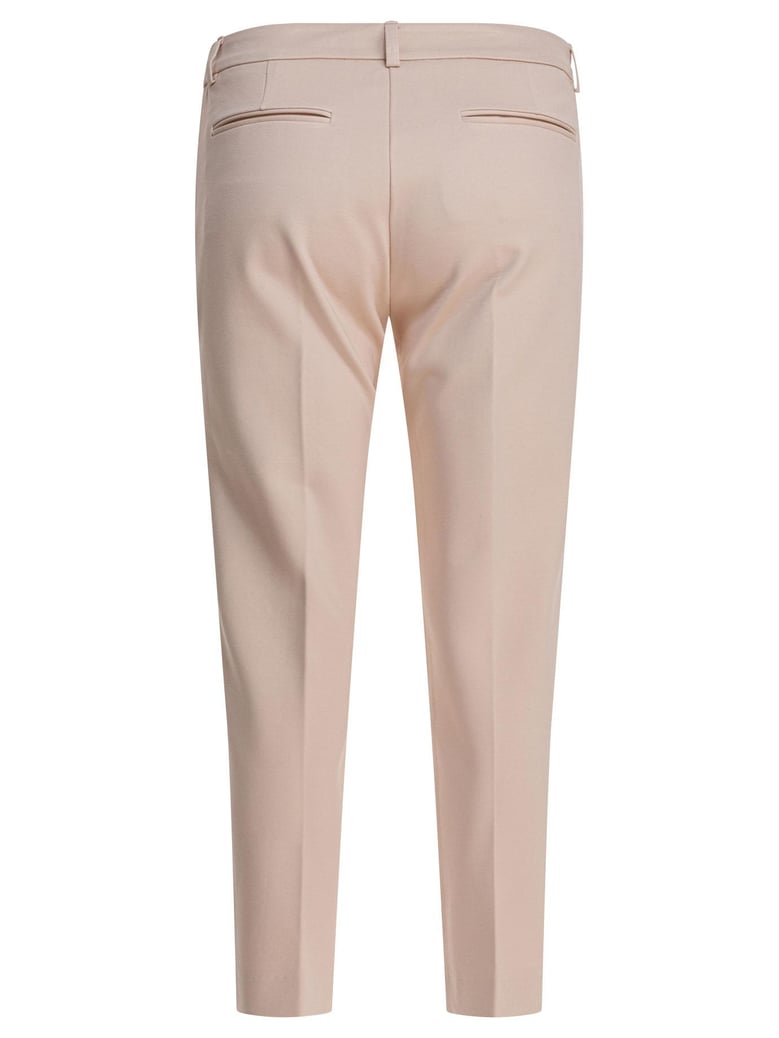 beige elastane trousers by Selfnex