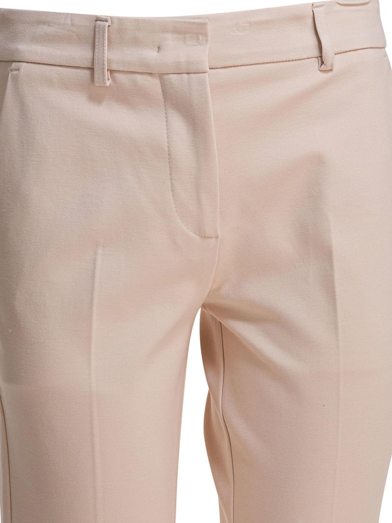 beige elastane trousers by Selfnex