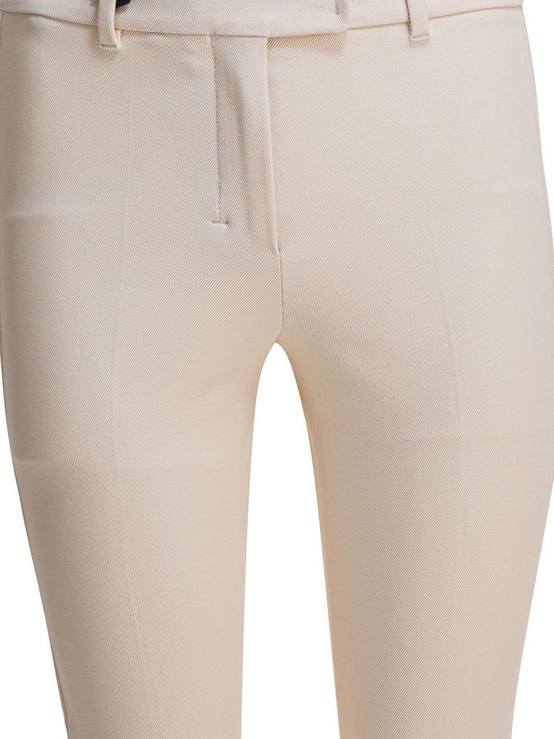 white elastane trousers by Selfnex