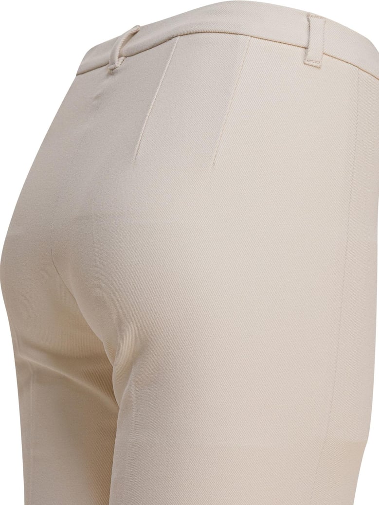 white elastane trousers by Selfnex