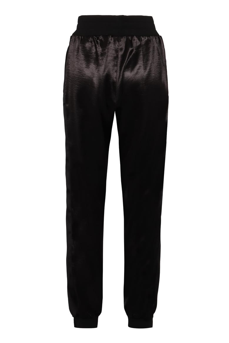 techno fabric track pants by Selfnex