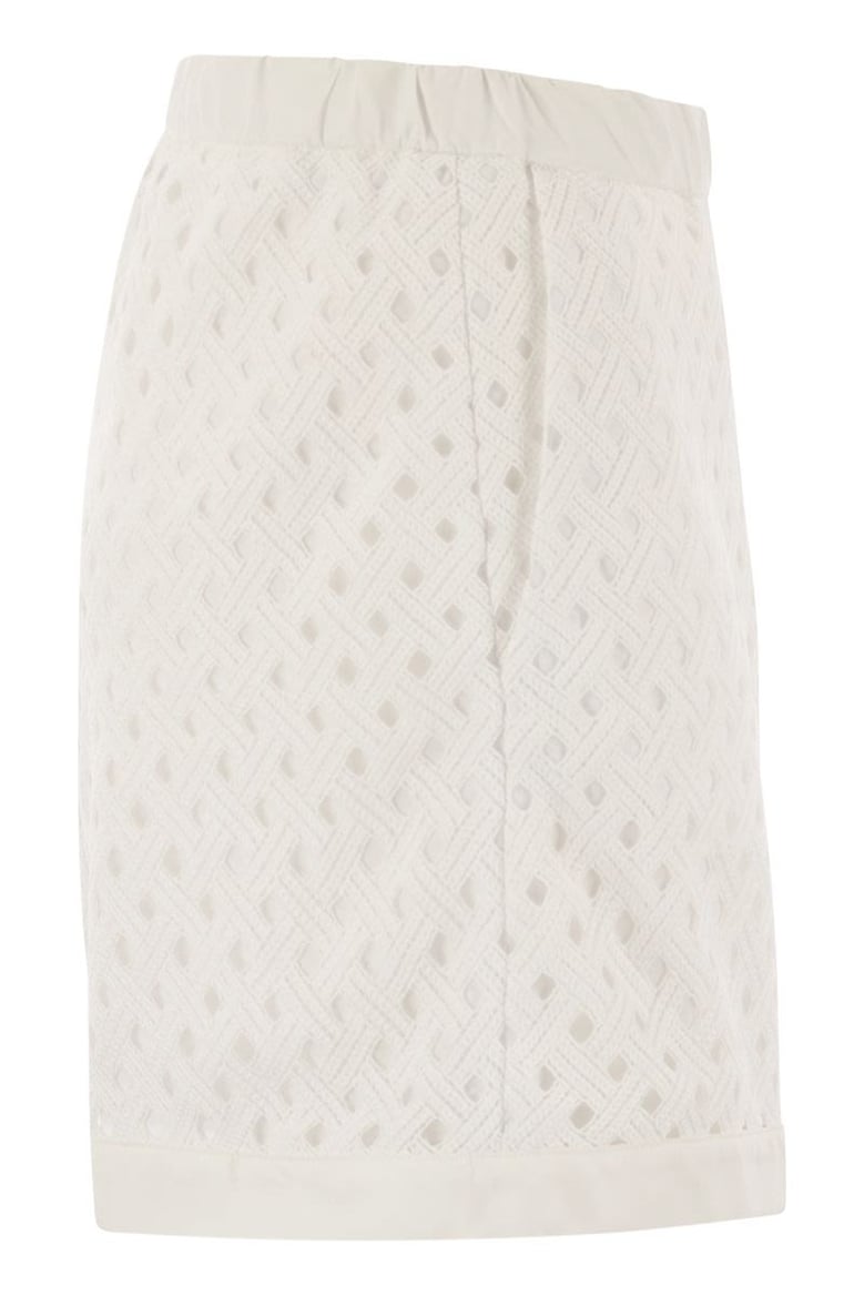 perforated shorts with geometric shapes by Selfnex