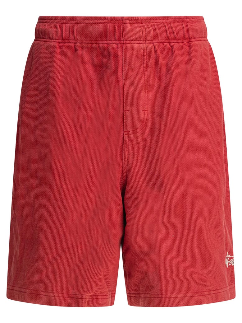 red polyester shorts by Selfnex