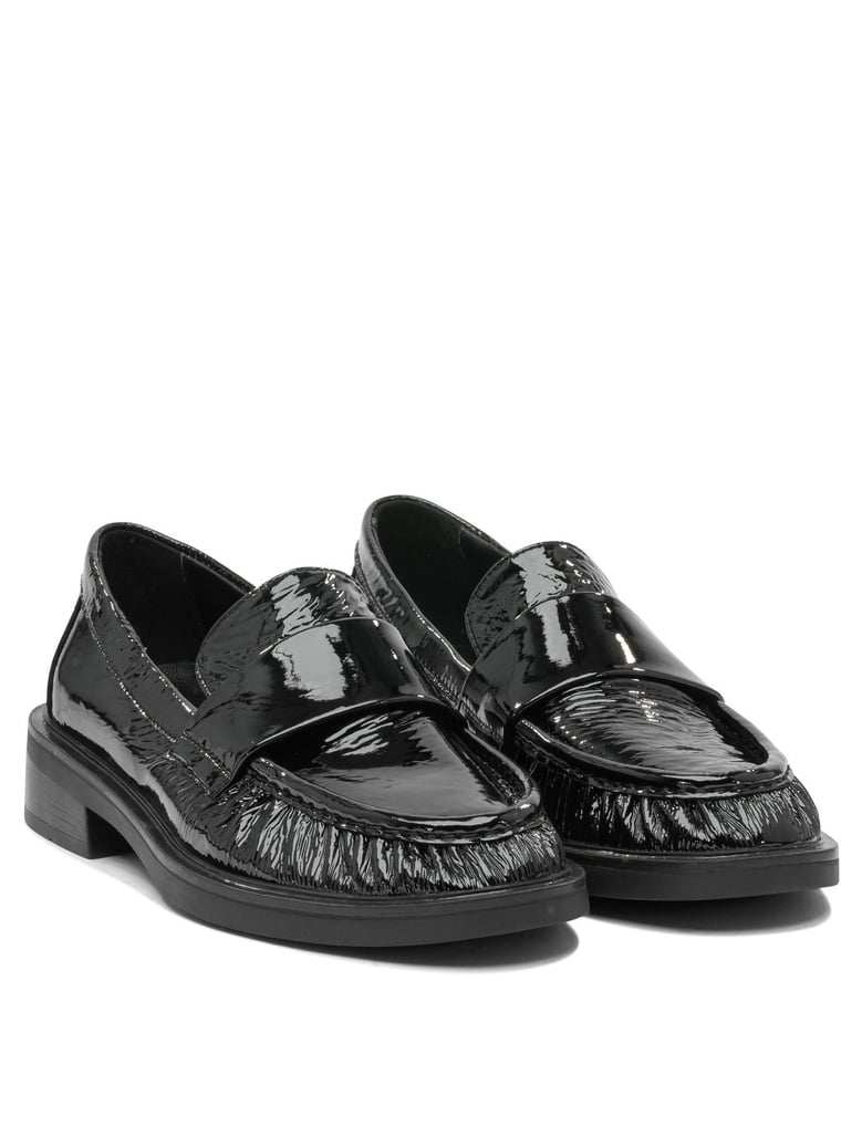 black rubber sandals by Selfnex