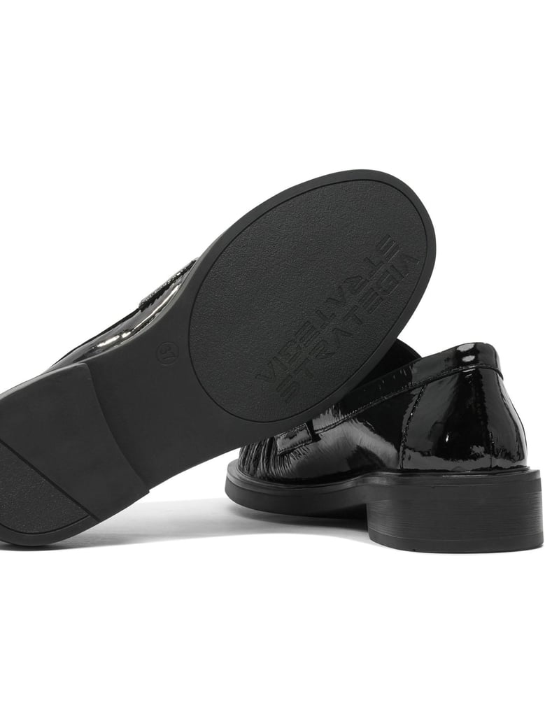 black rubber sandals by Selfnex